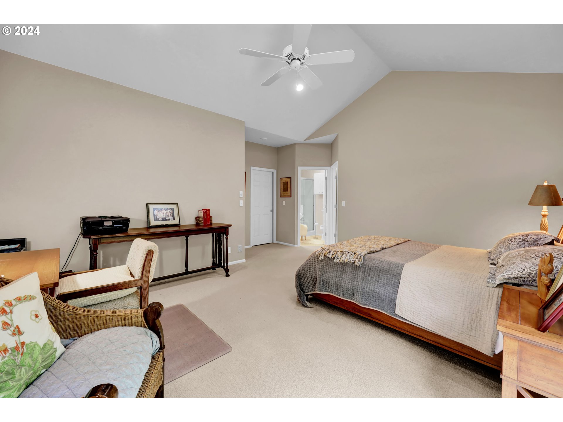 1281 Spyglass Drive Eugene, OR 97401 - Photo 21 of 37 a bed room with a bed and a couch