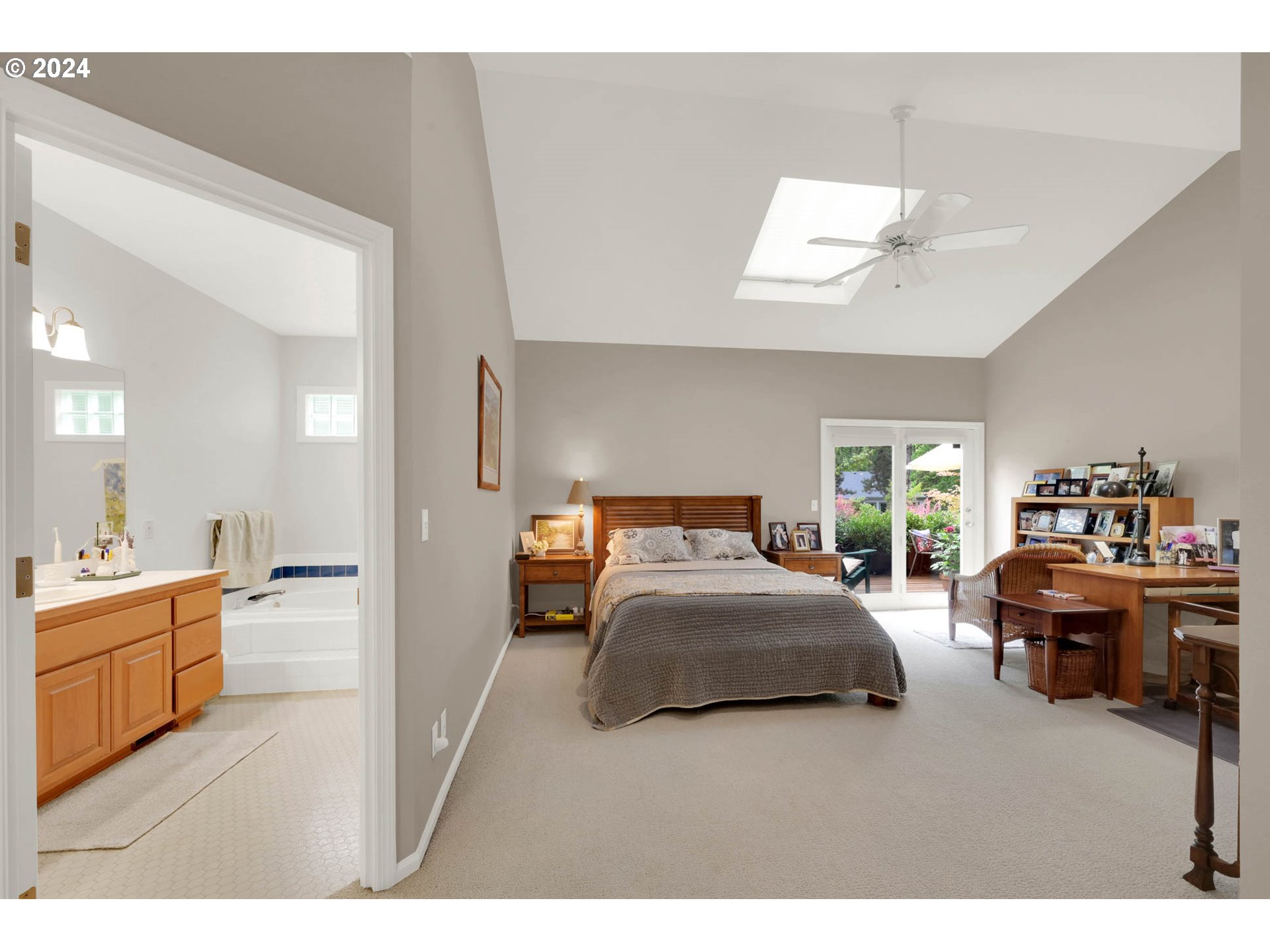 1281 Spyglass Drive Eugene, OR 97401 - Photo 22 of 37 a bedroom with furniture and a kitchen