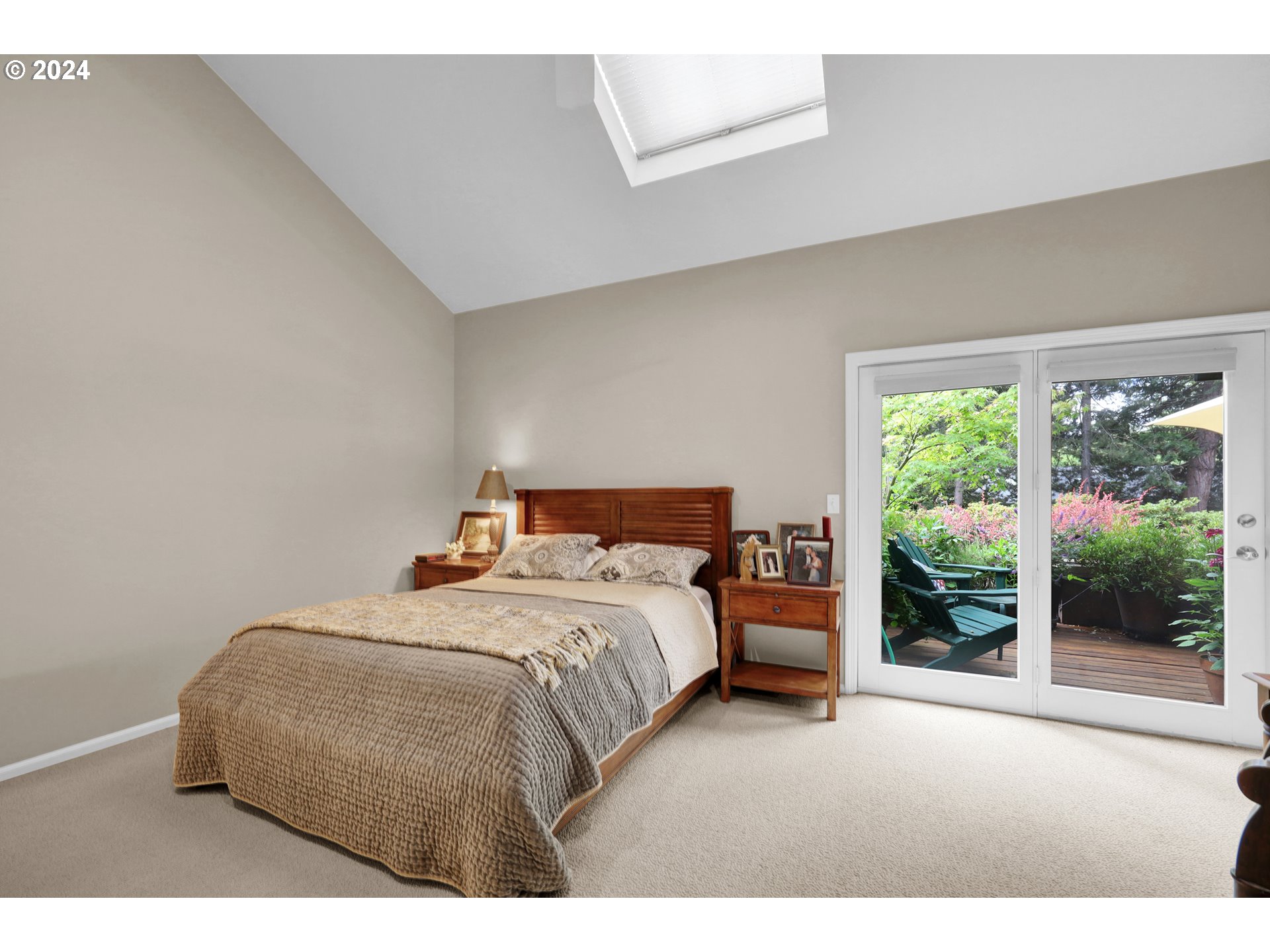 1281 Spyglass Drive Eugene, OR 97401 - Photo 23 of 37 a bedroom with a large bed and a large window