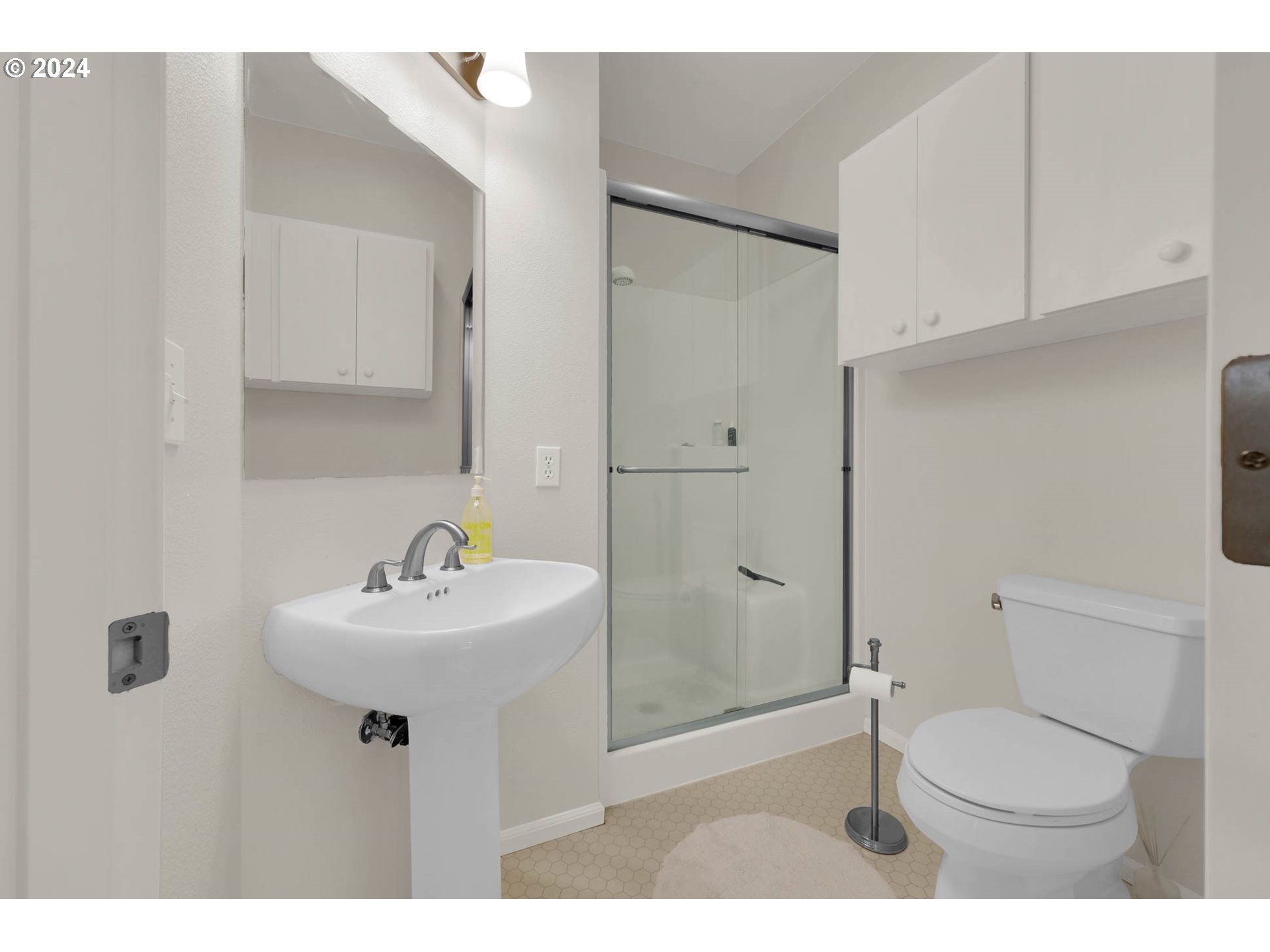 1281 Spyglass Drive Eugene, OR 97401 - Photo 26 of 37 a bathroom with a sink toilet and shower