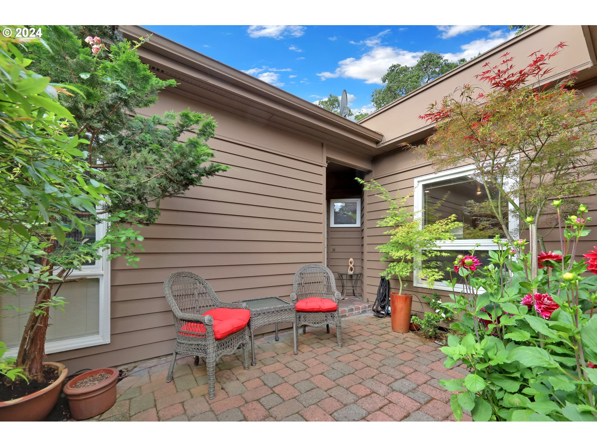 1281 Spyglass Drive Eugene, OR 97401 - Photo 33 of 37 a backyard of a house with seating space