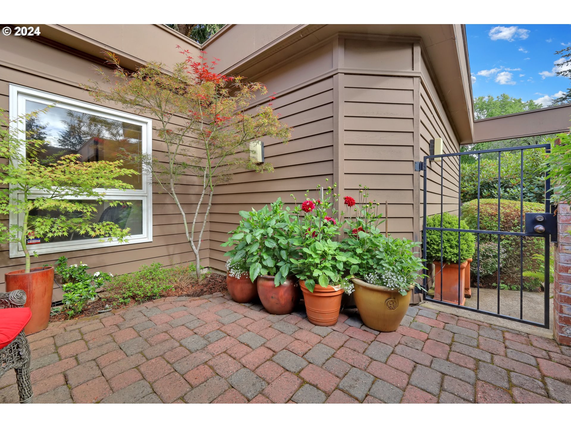1281 Spyglass Drive Eugene, OR 97401 - Photo 35 of 37 a view of a backyard with plants and garden