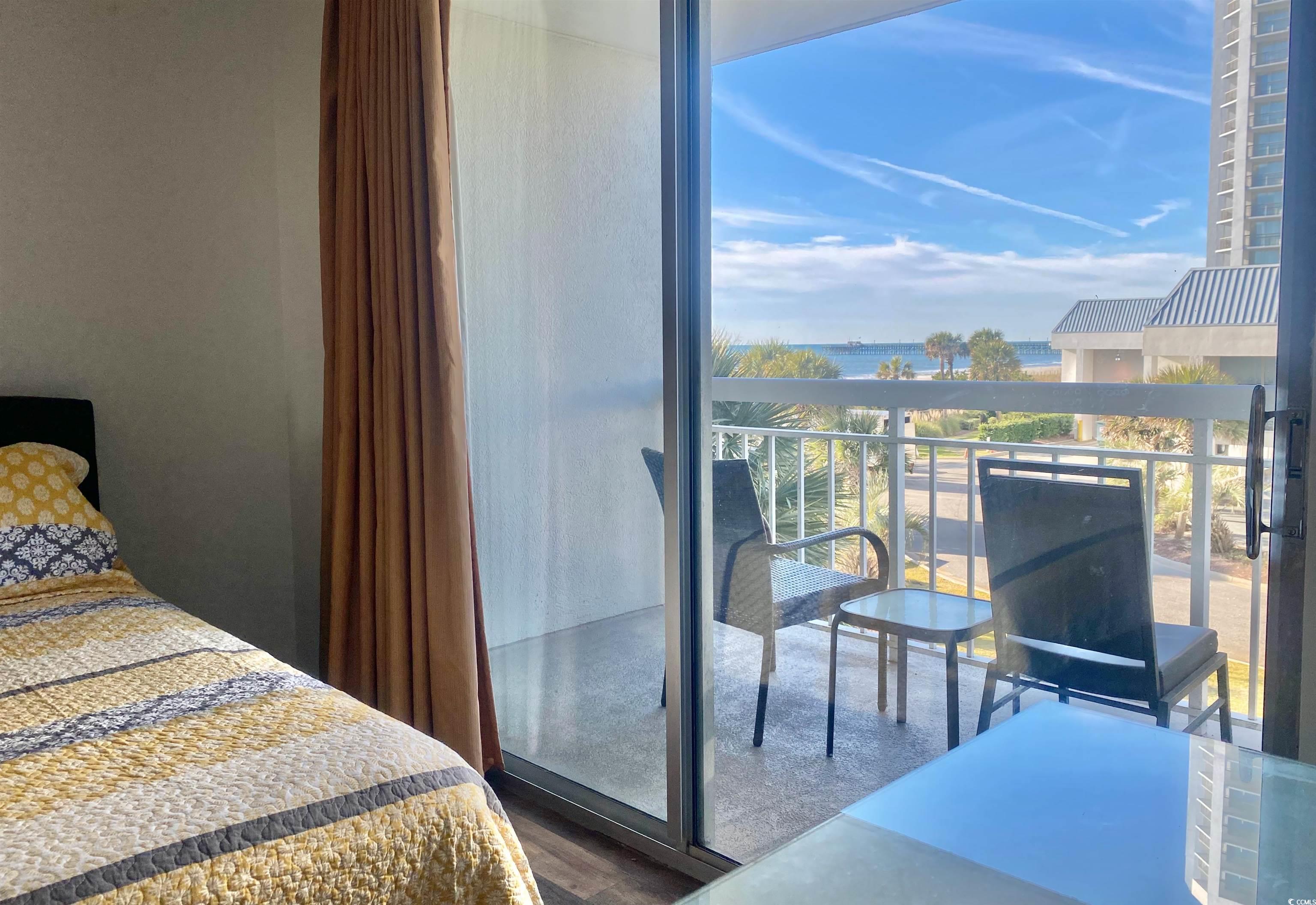 9820 Queensway Boulevard, Unit 206 Myrtle Beach, SC 29572 - Photo 35 of 40 Bedroom featuring a water view