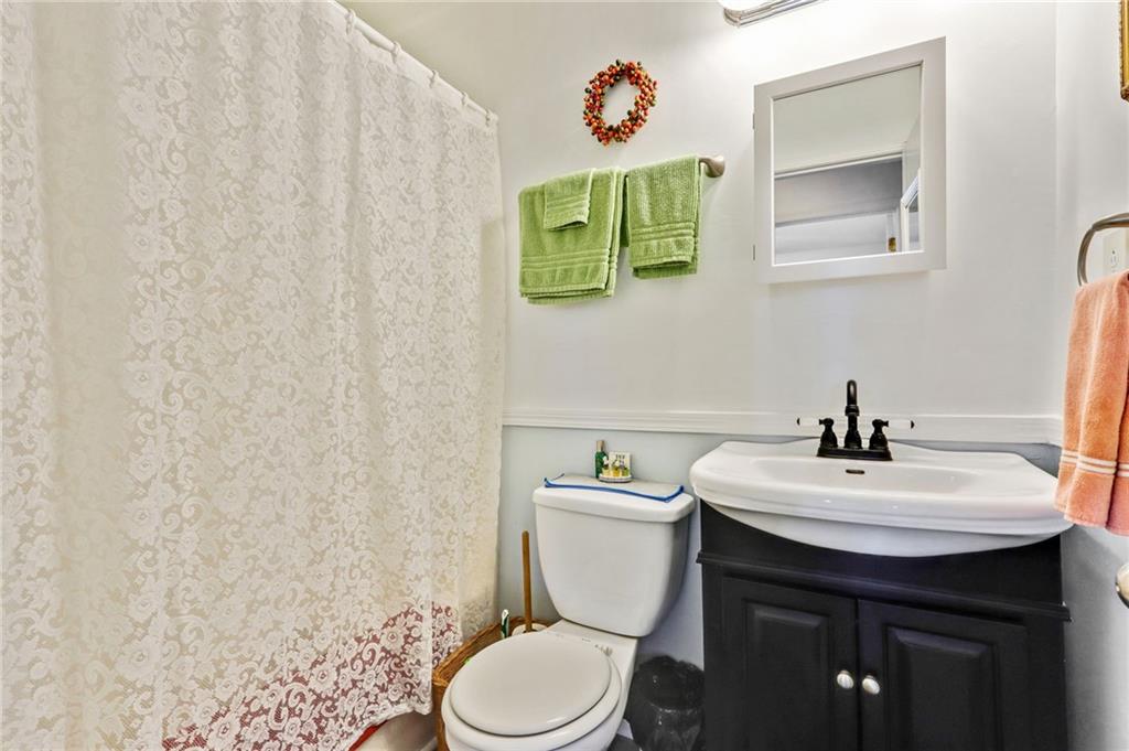 4339 Rex Road Rex, GA 30273 - Photo 11 of 23 a bathroom with a sink and a toilet