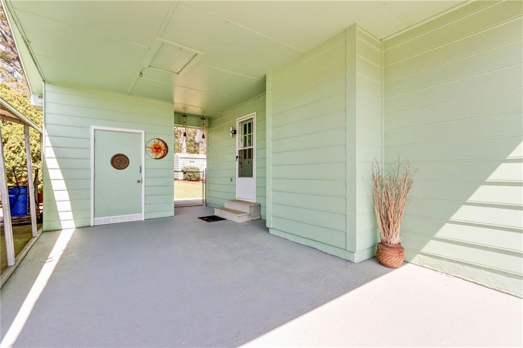 4339 Rex Road Rex, GA 30273 - Photo 16 of 23 a view of a room with stairs and a window