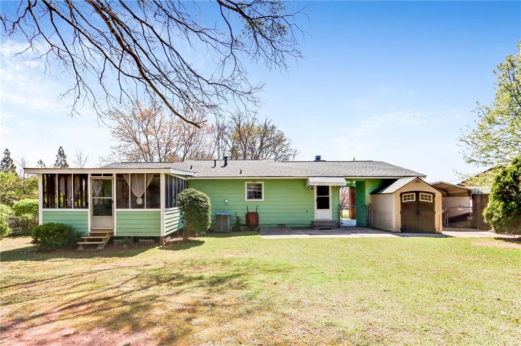 4339 Rex Road Rex, GA 30273 - Photo 17 of 23 a front view of a house with a yard