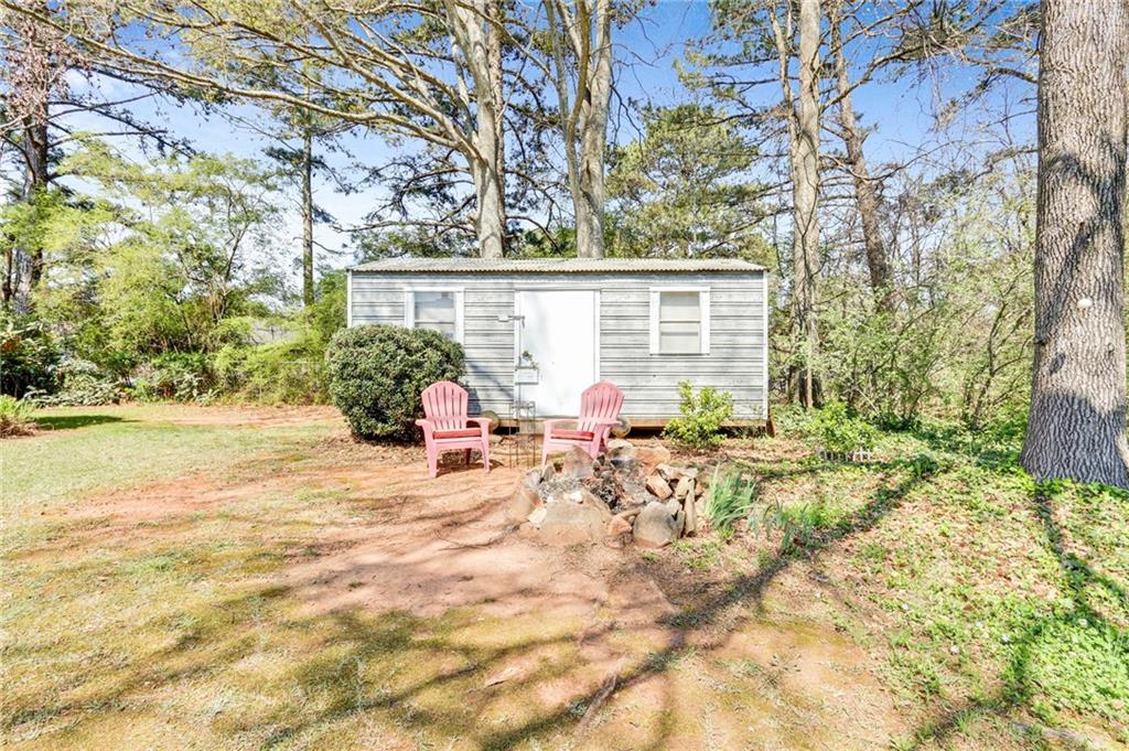 4339 Rex Road Rex, GA 30273 - Photo 20 of 23 a view of a house with backyard and sitting area