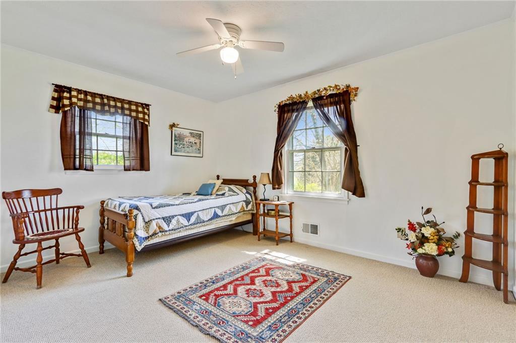 4339 Rex Road Rex, GA 30273 - Photo 9 of 23 a bedroom with furniture and a window