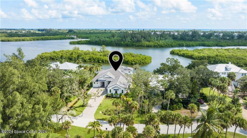 Undisclosed Address Vero Beach, FL 32963 - Photo 2 of 36 a view of a lake with a city
