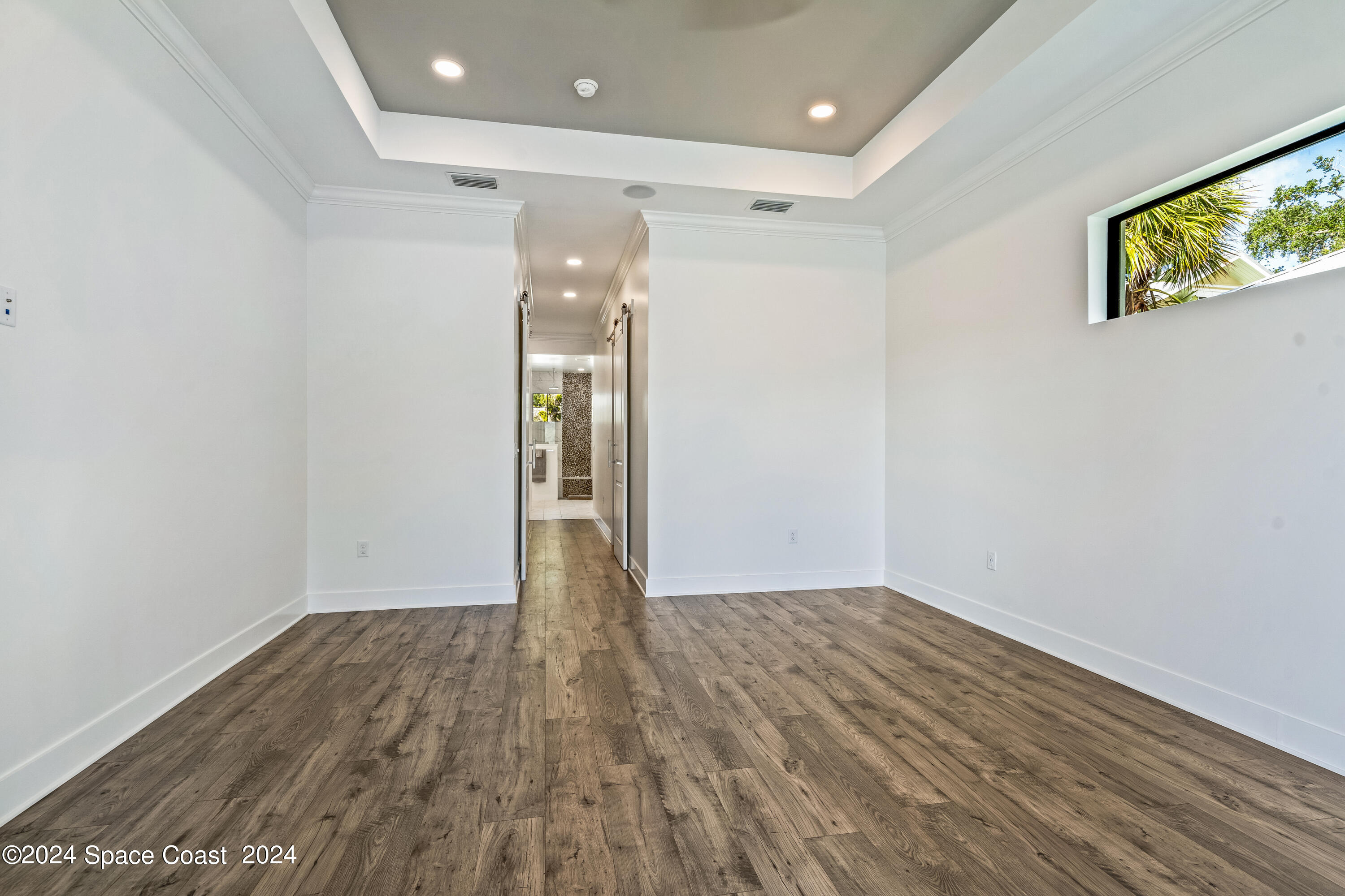 Undisclosed Address Vero Beach, FL 32963 - Photo 25 of 36 a view of empty room with wooden floor