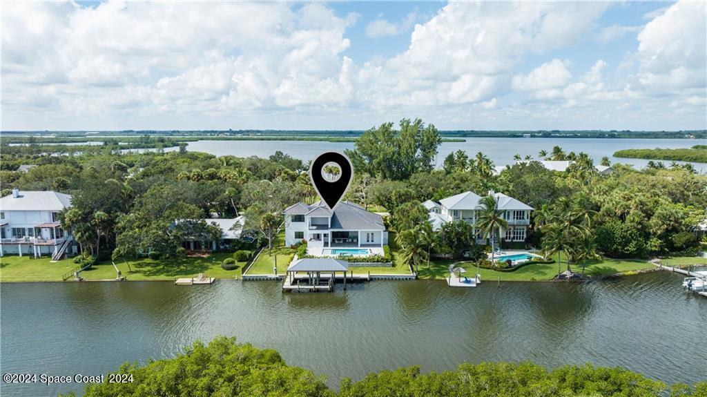 Undisclosed Address Vero Beach, FL 32963 - Photo 3 of 36 an aerial view of a house with swimming pool outdoor seating and yard