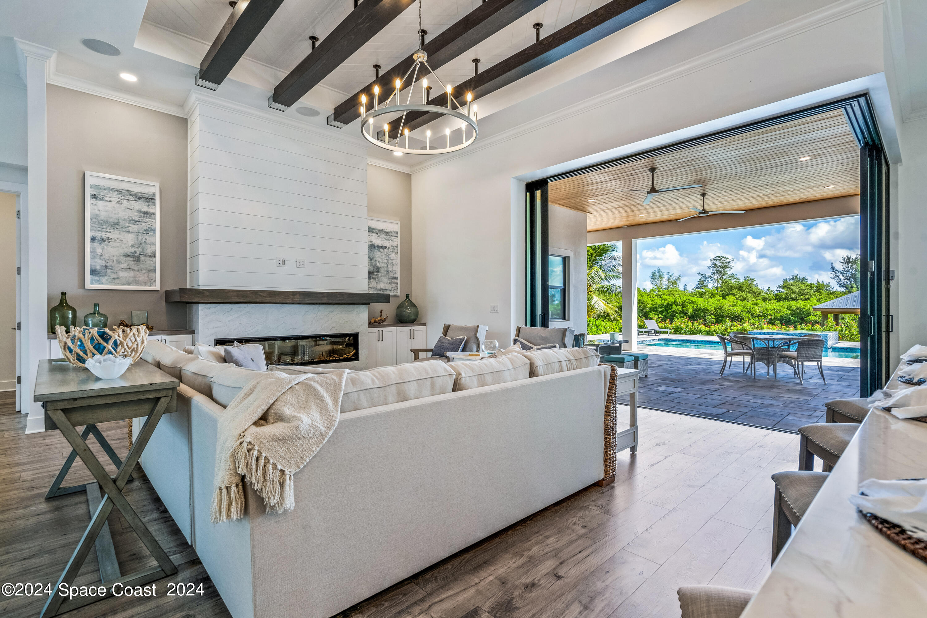 Undisclosed Address Vero Beach, FL 32963 - Photo 4 of 36 a living room with furniture and a large window