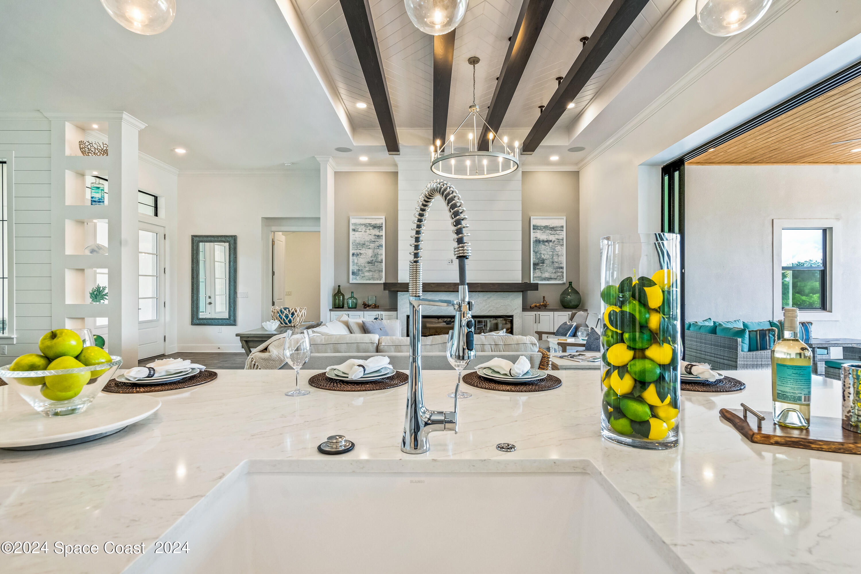 Undisclosed Address Vero Beach, FL 32963 - Photo 5 of 36 a view of living room with dining area and windows