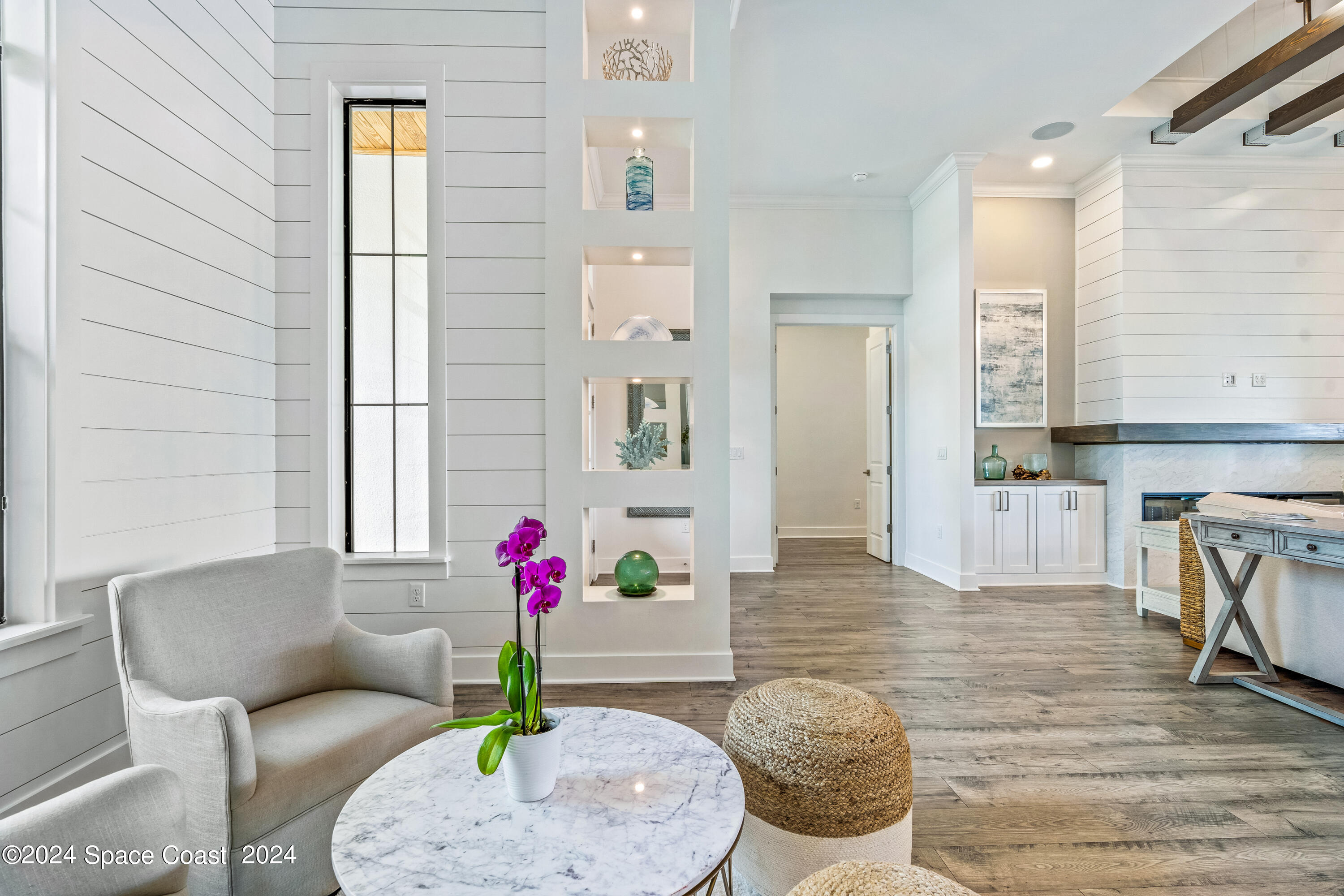 Undisclosed Address Vero Beach, FL 32963 - Photo 7 of 36 a living room with furniture potted plant and a rug