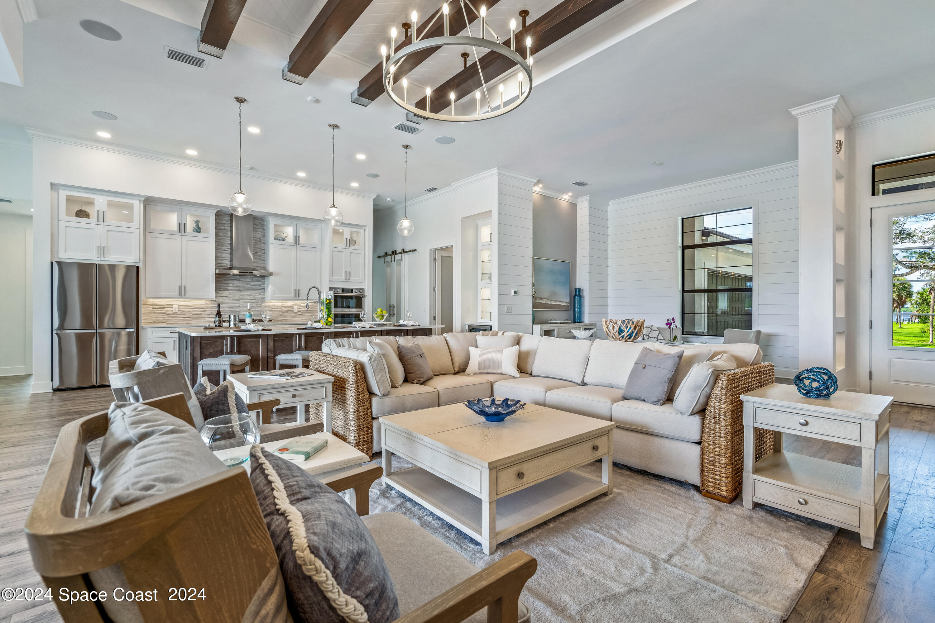 Undisclosed Address Vero Beach, FL 32963 - Photo 8 of 36 a living room with lots of furniture and a large window