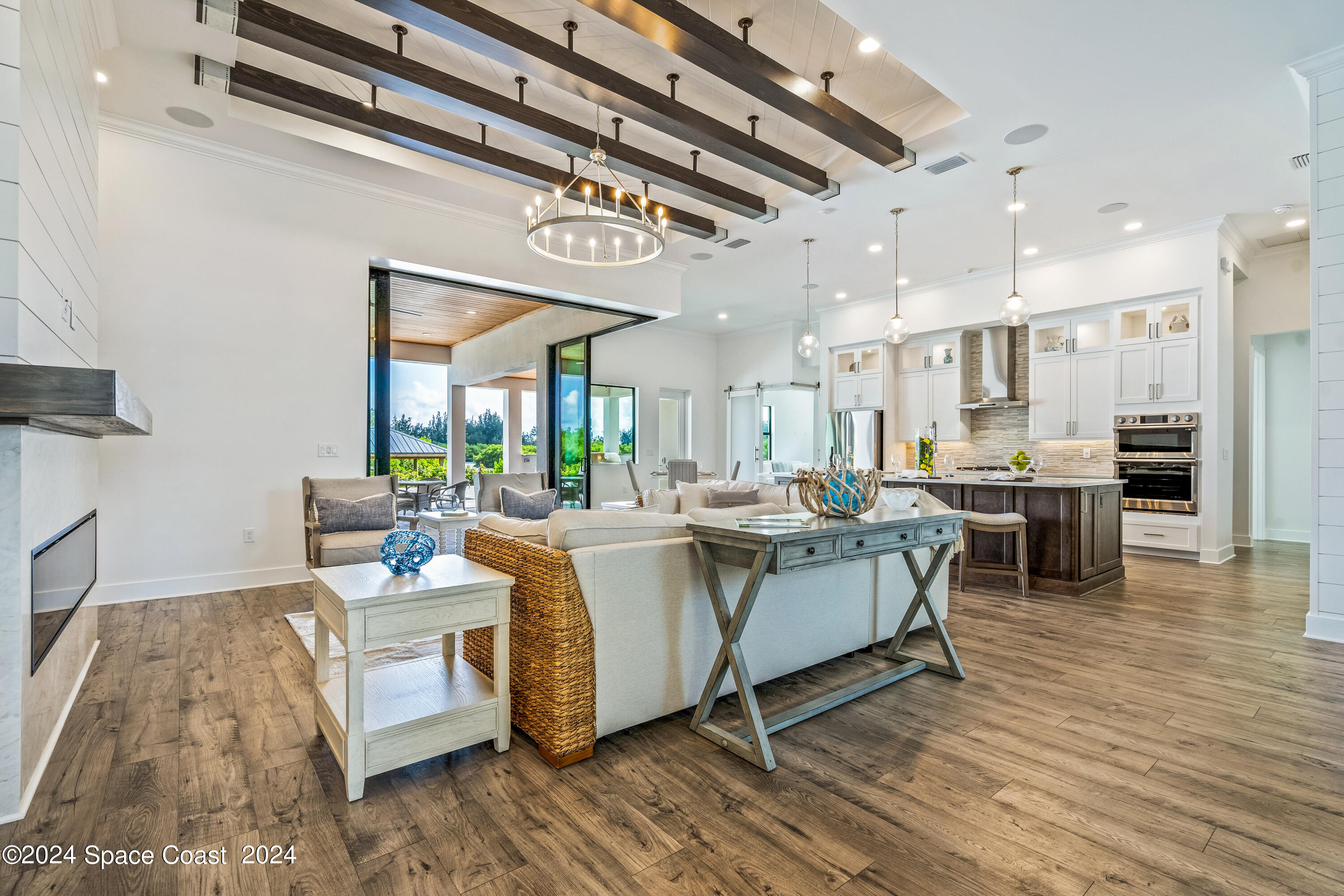 Undisclosed Address Vero Beach, FL 32963 - Photo 9 of 36 a living room with furniture and kitchen view
