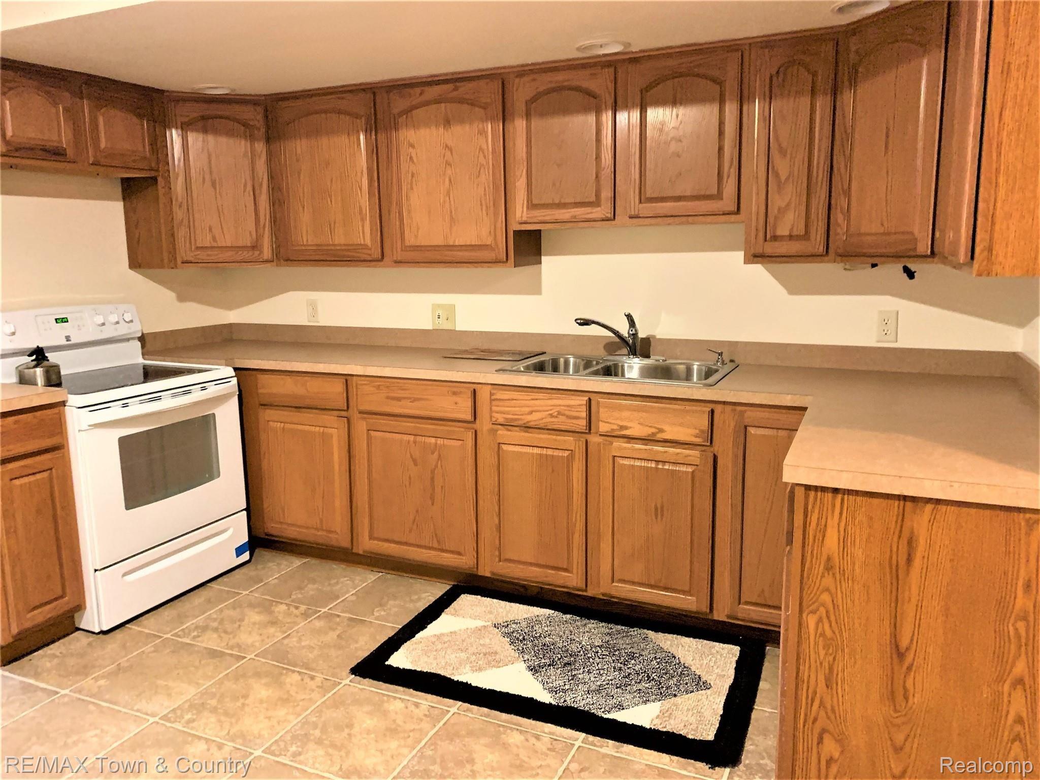 8215 Elms Road Flushing, MI 48433 - Photo 28 of 46 elms basementkitc.jpg