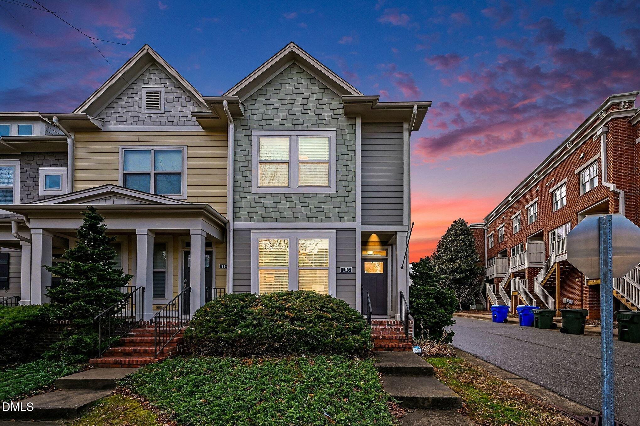106 Kiley Street Chapel Hill, NC 27516 - Photo 1 of 17 a front view of a house with a yard