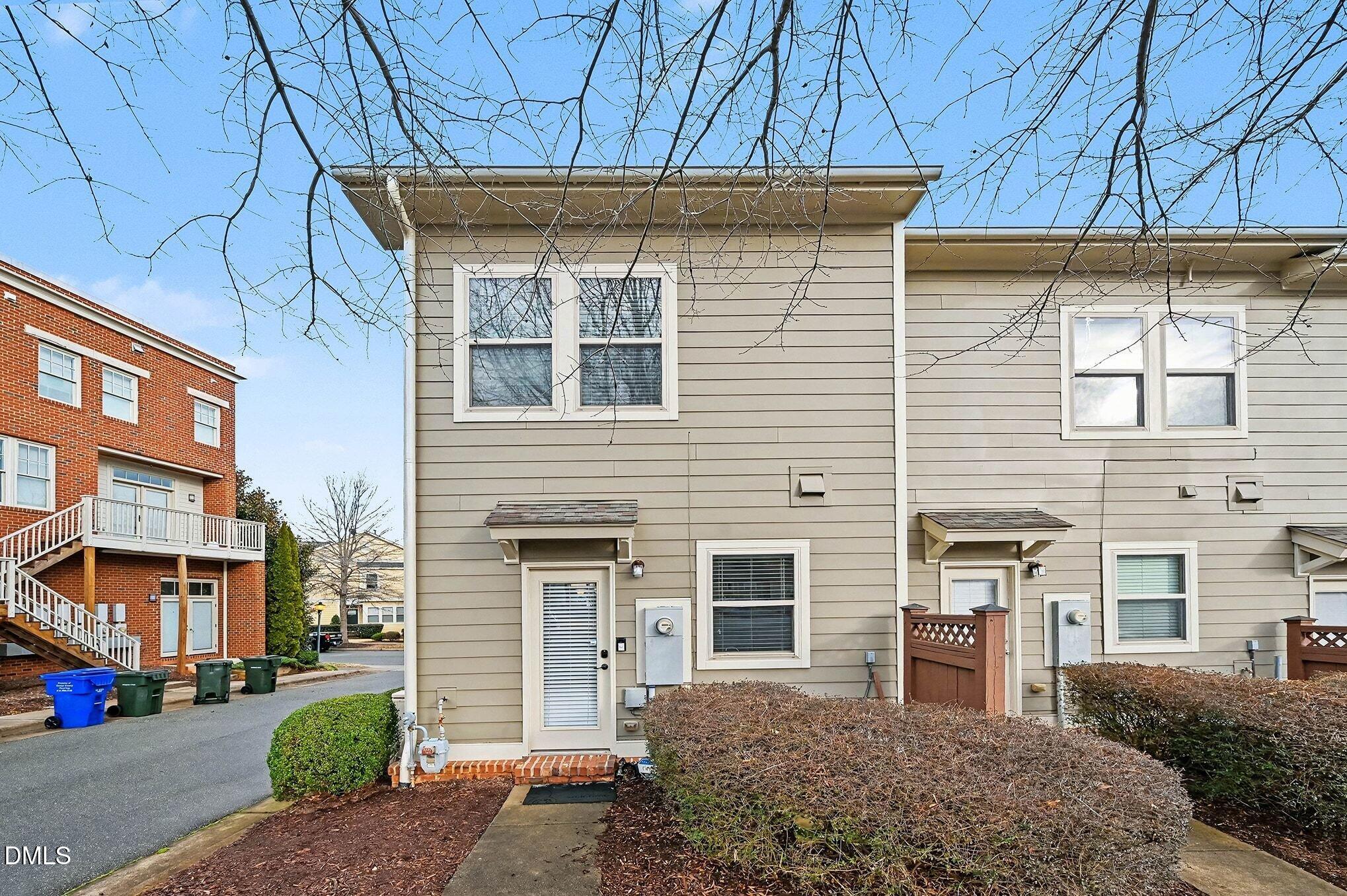 106 Kiley Street Chapel Hill, NC 27516 - Photo 17 of 17 a front view of a house with garden