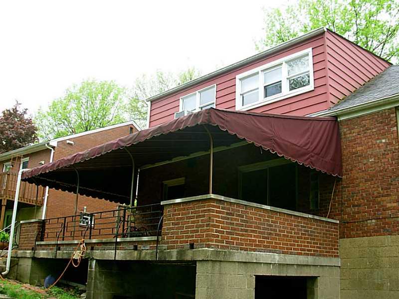 433 Edgewood Road Forest Hills, PA 15221 - Photo 22 of 25 Exterior Back. Big upper back patio off of the dining room.
