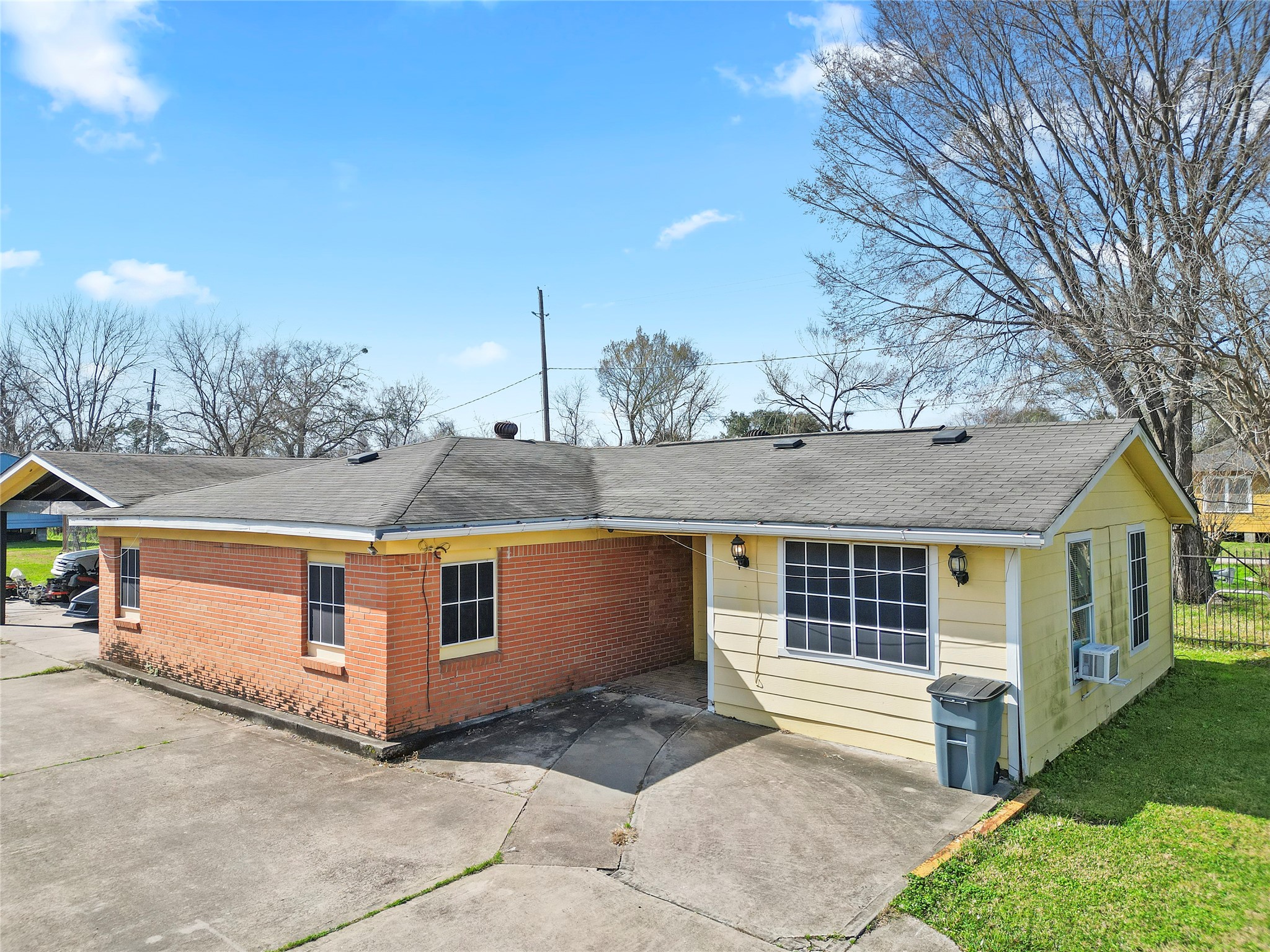 3127 Frick Road Houston, TX 77038 - Photo 12 of 16 a front view of a house with a yard