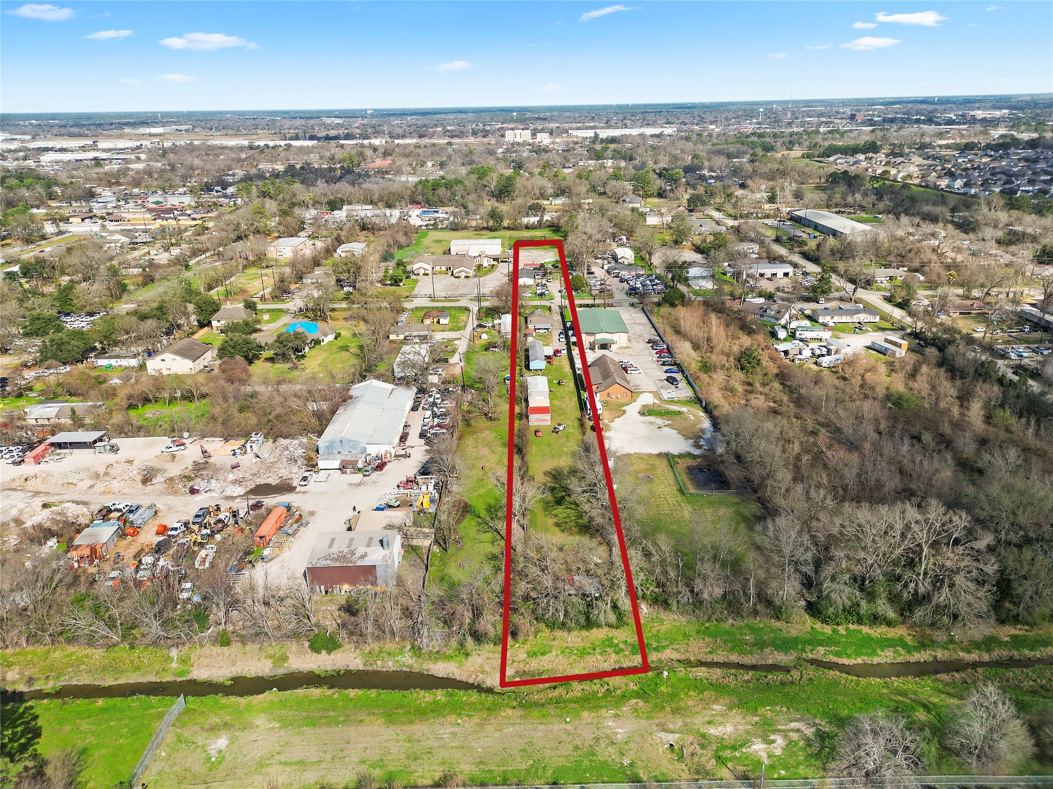 3127 Frick Road Houston, TX 77038 - Photo 14 of 16 an aerial view of residential building and lake