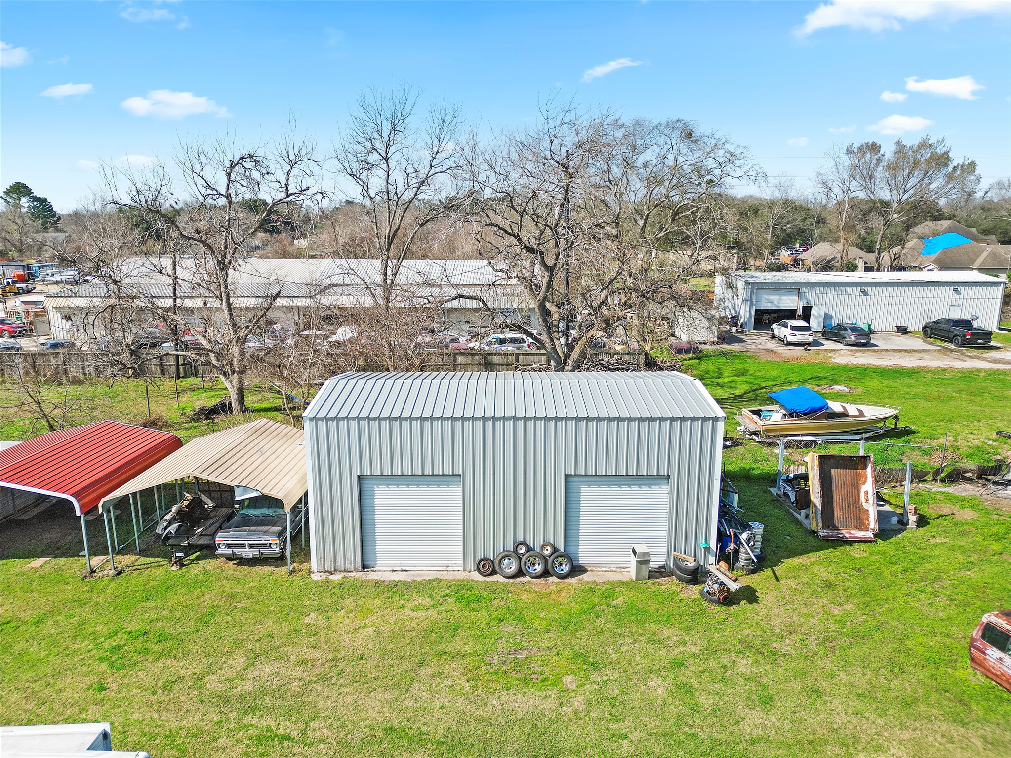 3127 Frick Road Houston, TX 77038 - Photo 4 of 16 a view of a house with a yard and sitting area