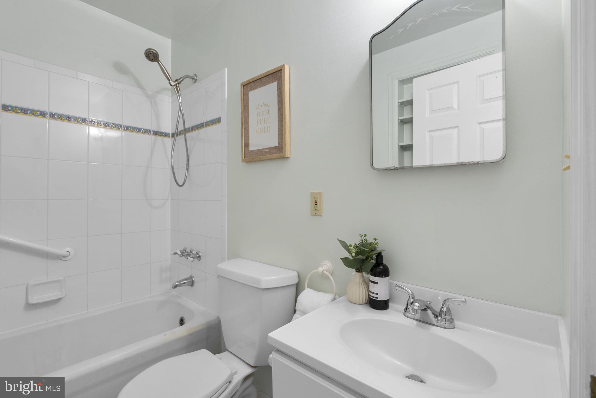 709 Woodside Parkway Silver Spring, MD 20910 - Photo 16 of 29 Main level hallway full bath