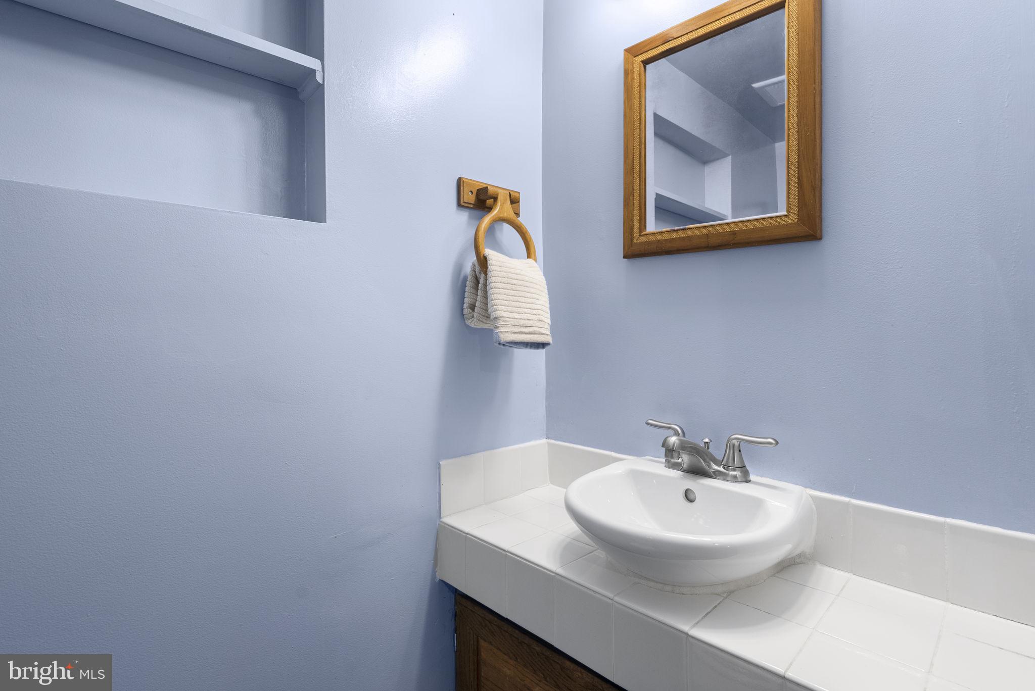 709 Woodside Parkway Silver Spring, MD 20910 - Photo 26 of 29 Lower level half bath