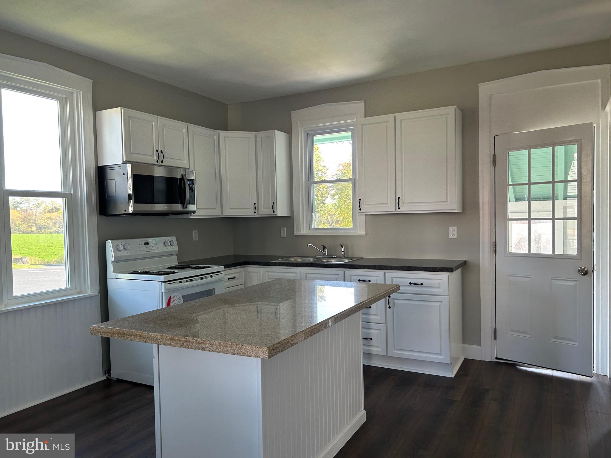2116 Main Street Lititz, PA 17543 - Photo 48 of 49 a kitchen with a sink a window and appliances