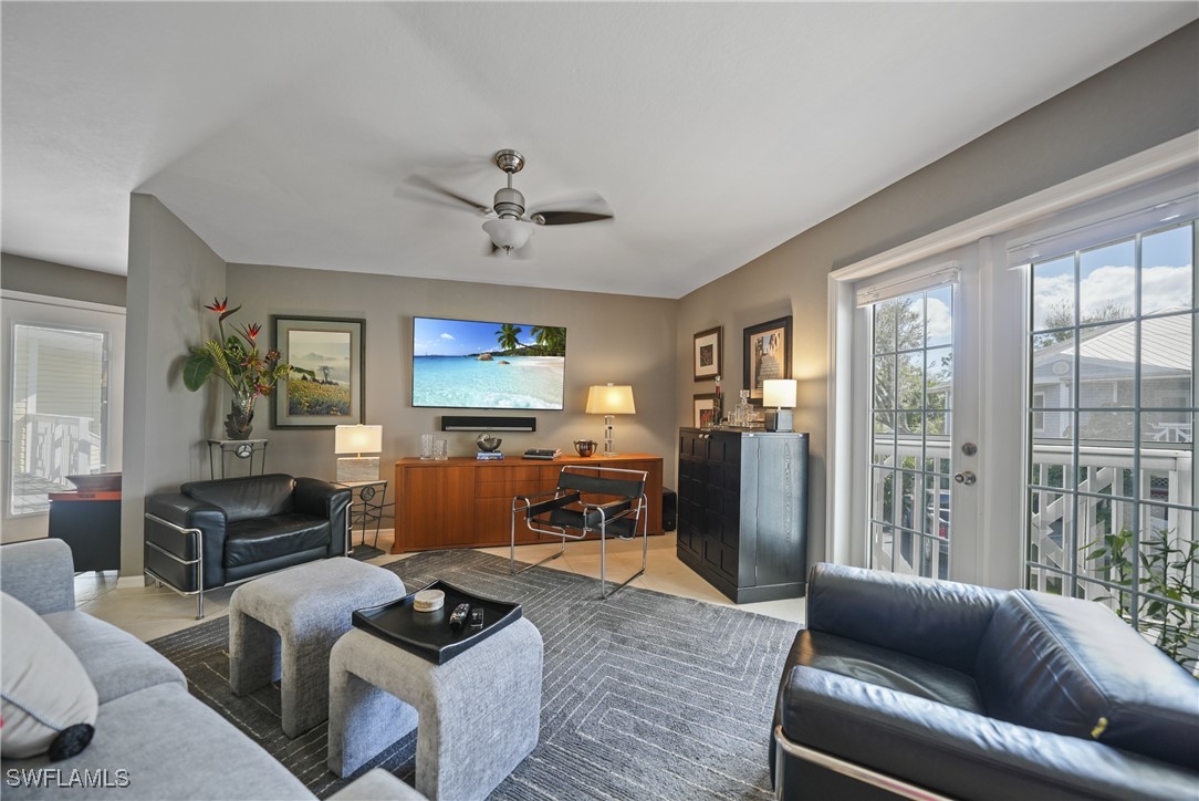 950 Moody Road, Unit 140 North Fort Myers, FL 33903 - Photo 18 of 46 a living room with furniture and a flat screen tv
