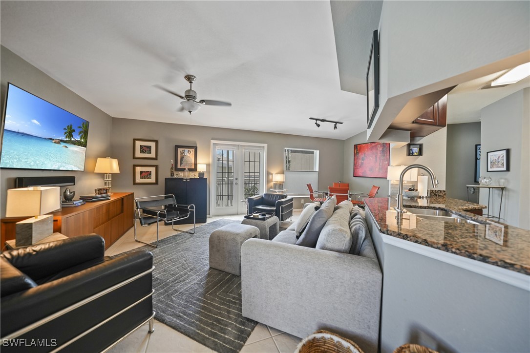 950 Moody Road, Unit 140 North Fort Myers, FL 33903 - Photo 19 of 46 a living room with furniture ceiling fan and a rug