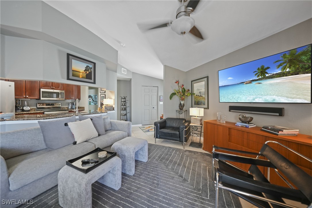 950 Moody Road, Unit 140 North Fort Myers, FL 33903 - Photo 20 of 46 a living room with furniture and a fireplace