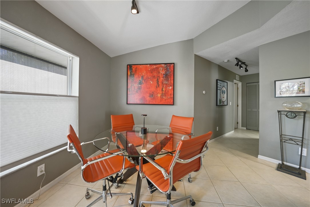950 Moody Road, Unit 140 North Fort Myers, FL 33903 - Photo 21 of 46 a dining room with furniture and a window