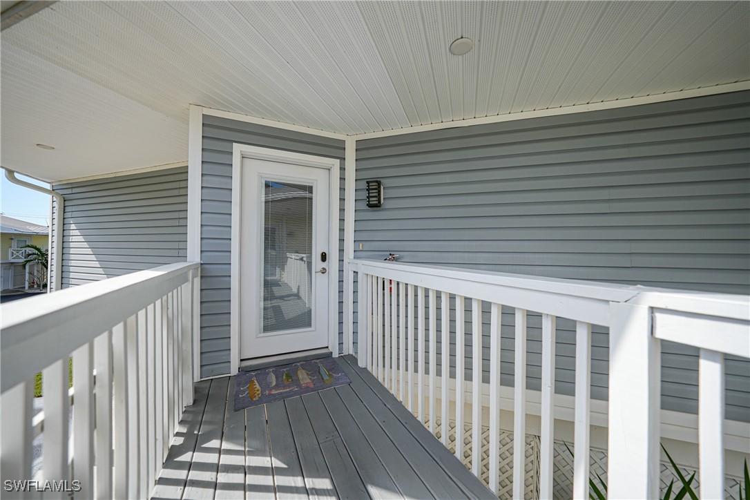 950 Moody Road, Unit 140 North Fort Myers, FL 33903 - Photo 28 of 46 a view of wooden balcony