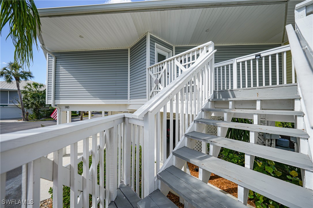 950 Moody Road, Unit 140 North Fort Myers, FL 33903 - Photo 29 of 46 a view of balcony with deck and wooden floor