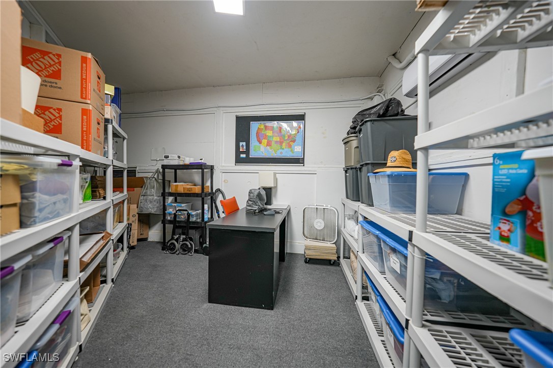 950 Moody Road, Unit 140 North Fort Myers, FL 33903 - Photo 33 of 46 a living room with furniture and a flat screen tv