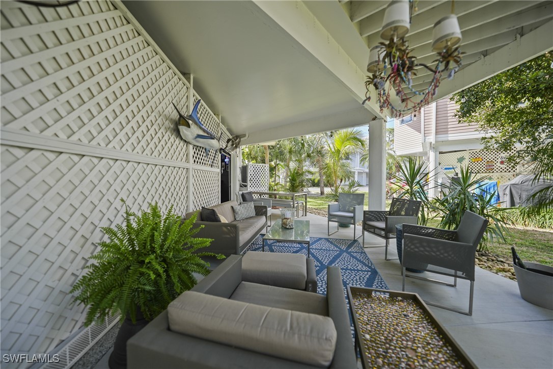 950 Moody Road, Unit 140 North Fort Myers, FL 33903 - Photo 38 of 46 a outdoor living space with furniture and garden view