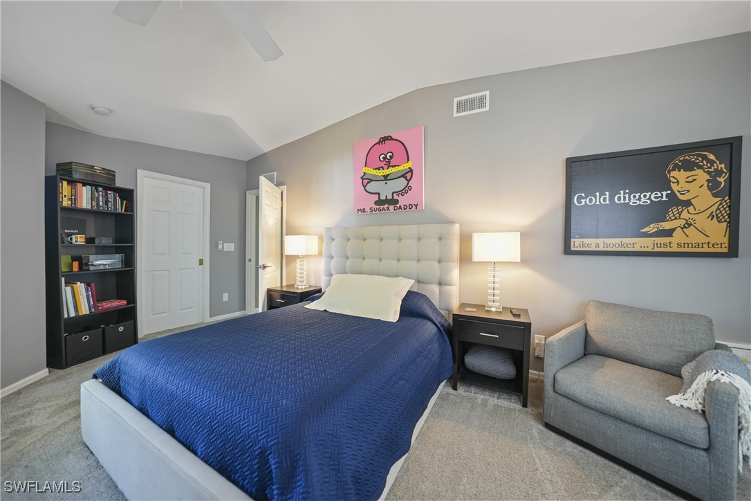 950 Moody Road, Unit 140 North Fort Myers, FL 33903 - Photo 10 of 46 a bedroom with a bed and dresser