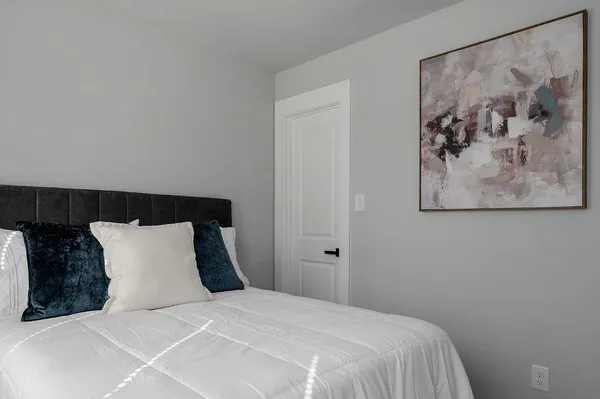 a view of a hallway with washer and dryer