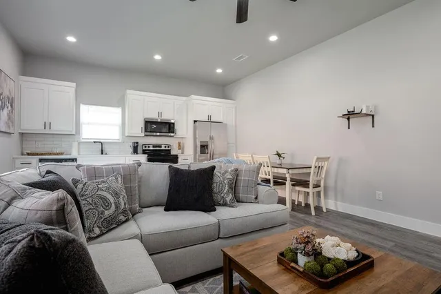 a living room with furniture and a couch