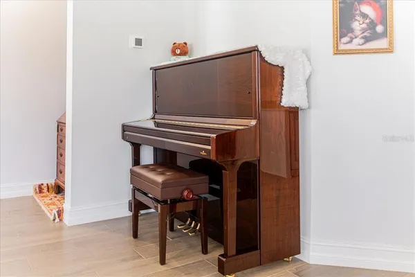 a bedroom with a bed and a desk