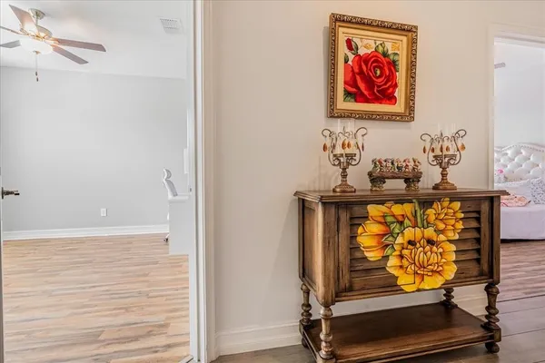 a view of a hallway with workspace