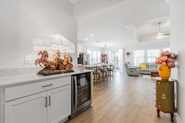 a kitchen with stainless steel appliances a stove a sink and a refrigerator