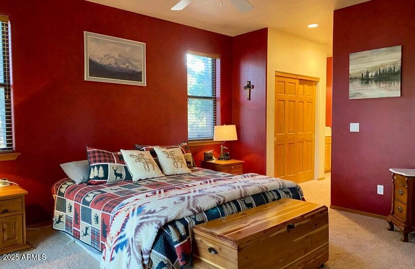 1100 South Pinon Drive Show Low, AZ 85901 - Photo 12 of 30 a bedroom with a bed and cupboard