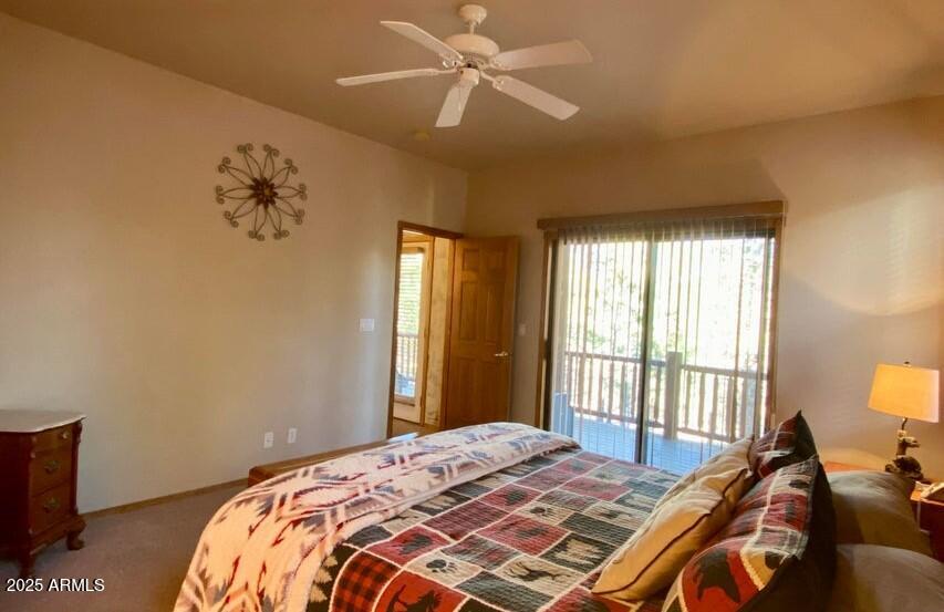 1100 South Pinon Drive Show Low, AZ 85901 - Photo 13 of 30 a bedroom with a bed and a window