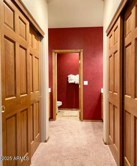 1100 South Pinon Drive Show Low, AZ 85901 - Photo 14 of 30 a view of a hallway with wooden floor and entryway