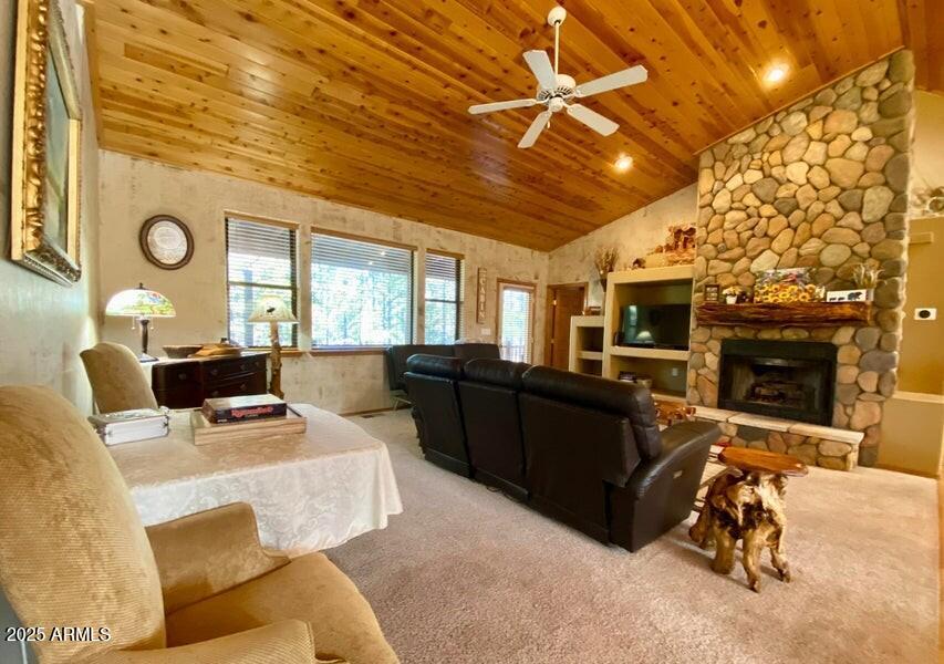 1100 South Pinon Drive Show Low, AZ 85901 - Photo 5 of 30 a living room with furniture and a fireplace