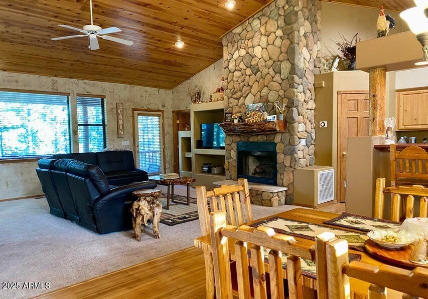 1100 South Pinon Drive Show Low, AZ 85901 - Photo 7 of 30 a living room with furniture and a chandelier