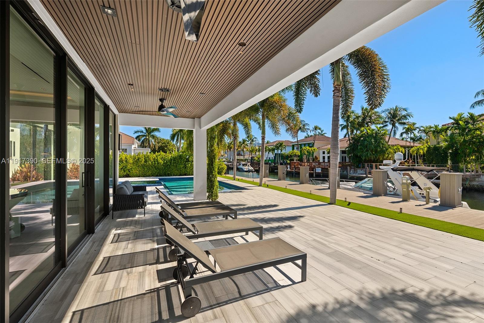 900 Washington Street Hollywood, FL 33019 - Photo 41 of 61 a view of swimming pool with seating area and furniture